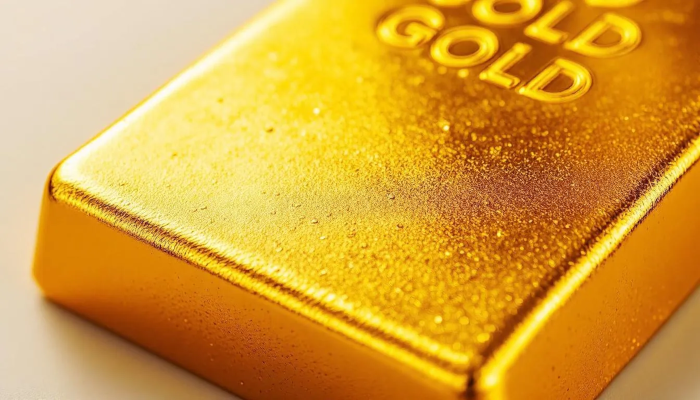 A shiny gold bar is depicted, showcasing its smooth surface and rectangular shape, symbolizing wealth and value. This image represents the concept of purchasing scrap gold and offers a glimpse into the world of gold investment and trading.